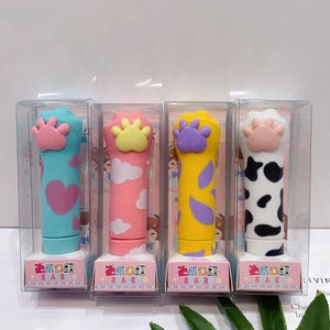 Detailed view of cat paw lipstick-style erasers in four cute pastel colors and patterns