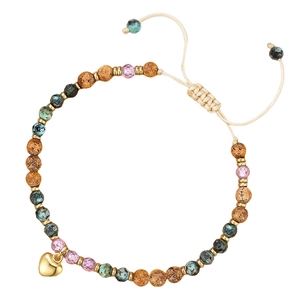 Detail showing 4mm natural African Turquoise beads and a polished gold heart charm on bracelet