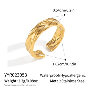 Detail showing 18K gold-plated twisted stainless steel ring with waterproof features
