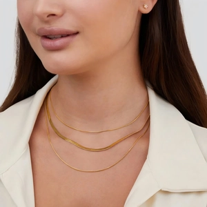 Three-layer gold-plated snake chain necklace set with matching flower stud earrings