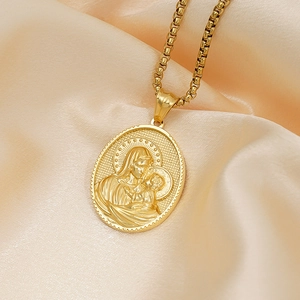 3D embossed Madonna and Child pendant necklace in gold stainless steel on champagne silk