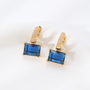 Golden earrings with square blue zircon gemstones and micro-pave white stones decoration