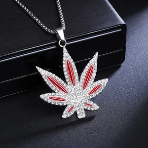 Hip hop style maple leaf necklace with sparkling crystals and red enamel detailing