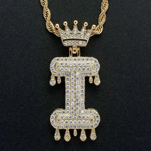 Hiphop gold necklace with iced-out letter I pendant and crown detail on rope chain