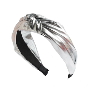 Close-up of silver knotted PU leather headband with metallic finish and wide brim
