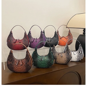 Detailed collection of colorful hobo bags with crocodile pattern in various stylish textures