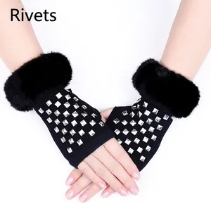 Chic black fingerless knit gloves with faux fur trim and silver pyramid studs decoration