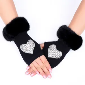Cute black knit fingerless gloves with rhinestone heart and faux fur cuff for women