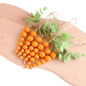 Spring Easter carrot beaded garland with wooden beads and green leaves for farmhouse decor