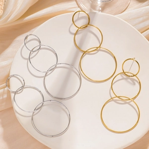 Three-tier geometric hoop drop earrings in 18k gold and silver stainless steel finish