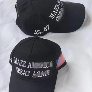 Classic black cotton baseball cap with white embroidered Make America Great Again text