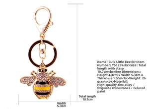 Detailed view of the bee keychain with crystals, lobster clasp, and gold-tone ring