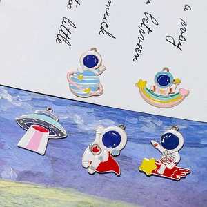 DIY cartoon astronaut and UFO charms set with vibrant colorful enamel finish