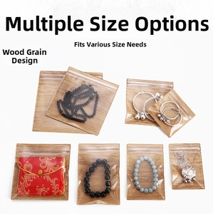 Transparent wood-grain PVC jewelry bags in various sizes for beads and necklaces