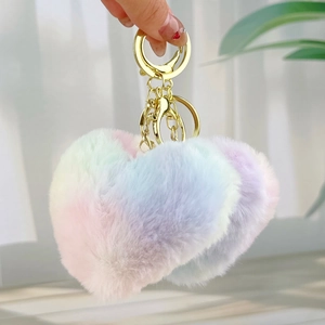 Colorful macaque plush heart keychain with gradient faux fur and gold metal clasp