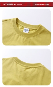 Detailed view of yellow crew neck T-shirt neckline with 210g fabric and brand label