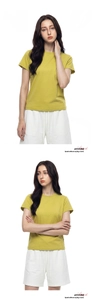 Detail of a mustard yellow slim-fit T-shirt and white drawstring cotton shorts set
