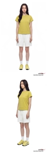 Front and side view of ginger yellow cooling t-shirt and white athletic shorts set