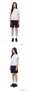 Detail view of white HEIQ cooling t-shirt and black drawstring shorts for summer outfits