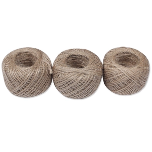 Detailed view of three rolls of natural jute twine for DIY crafts and gift wrapping