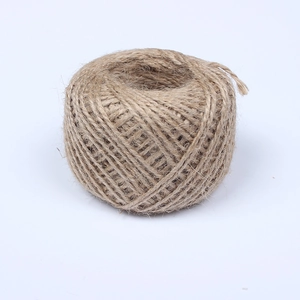 Close-up of a natural jute twine roll with rich fiber texture for DIY Christmas crafts