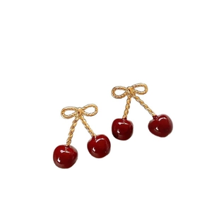 Golden bow knot and red cherry earrings with vintage glossy finish for women