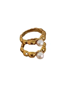 French vintage gold lava rings set with organic texture and white freshwater pearls