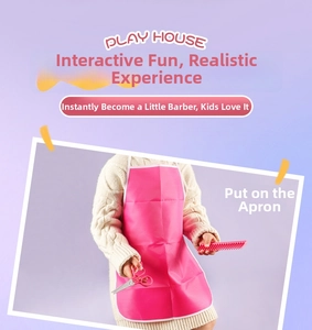 Detailed view of pink hair salon toy set including a waterproof apron and accessories