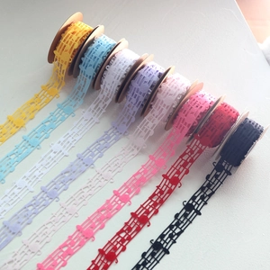 Elegant music note lace ribbons in eight colors on vintage kraft spools for gift wrapping