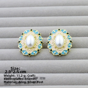 Detailed size view of retro floral enamel earrings with pearls and blue accents
