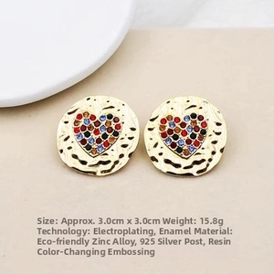 Detail showing 3.0cm vintage enamel heart stud earrings with 925 silver needles