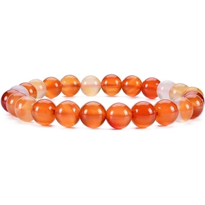 Close-up of natural red agate beads bracelet with banded patterns and polished finish