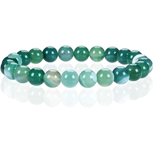 Detailed view of natural green agate beads bracelet with translucent texture on white background