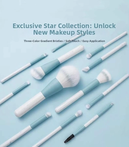 Detail of 12-piece makeup brush set with gradient bristles and marble texture handles
