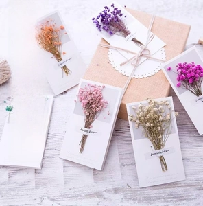Detailed view of dried flower bouquets on cards with Especially for you labels