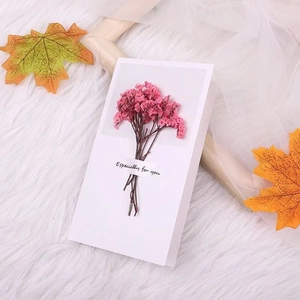 Detail of pink dried gypsophila flower card with Especially for you golden script