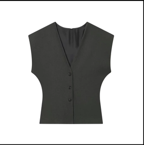 Detail of dark grey V-neck sleeveless vest with three buttons and tailored waist