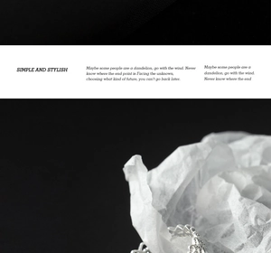 Detailed view of S925 silver lace ring with pavé zircons on textured white paper