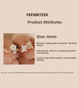 Detailed view of 14K gold filled butterfly and flower rings with 6mm Hetian jade stones