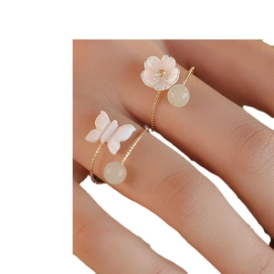 Natural Hetian jade rings for women featuring floral and butterfly motifs in gold finish