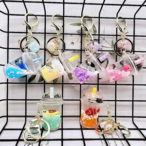 Acrylic floating liquid keychain set with ocean animals, glitter, and colorful charms