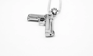 Detailed close-up of a punk-style large silver pistol pendant with a steel chain