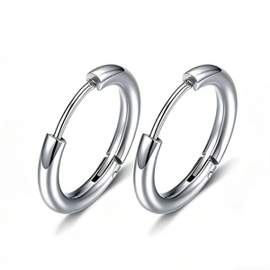 Polished stainless steel huggie hoop earrings with high gloss silver finish on white background