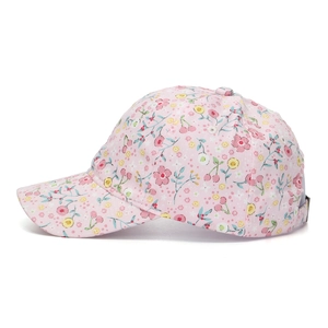 Close-up of pink cotton baseball cap featuring floral and cherry prints with fine stitching