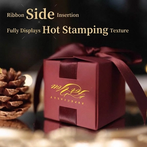 Elegant wine red wedding favor box with gold foil stamping and matching satin ribbon