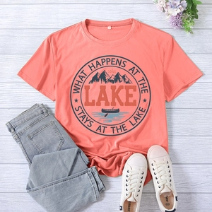 Flat lay of coral Lake T-shirt with blue denim jeans and white canvas shoes