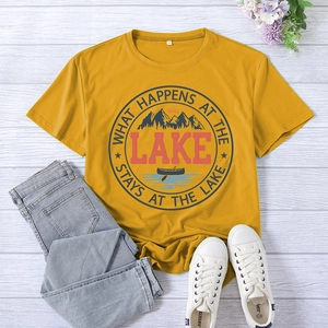Close-up of bright yellow graphic tee with outdoor mountain print and xxl size label