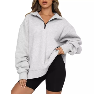 Women's oversized grey half-zip sweatshirt with drop shoulder and long sleeves