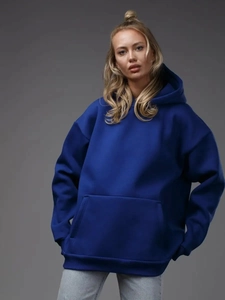 Detail of Klein blue oversized hoodie featuring drop shoulders and a kangaroo pocket