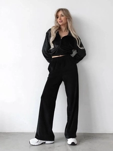Women black velvet tracksuit set with a cropped zip hoodie and high-waisted wide-leg pants